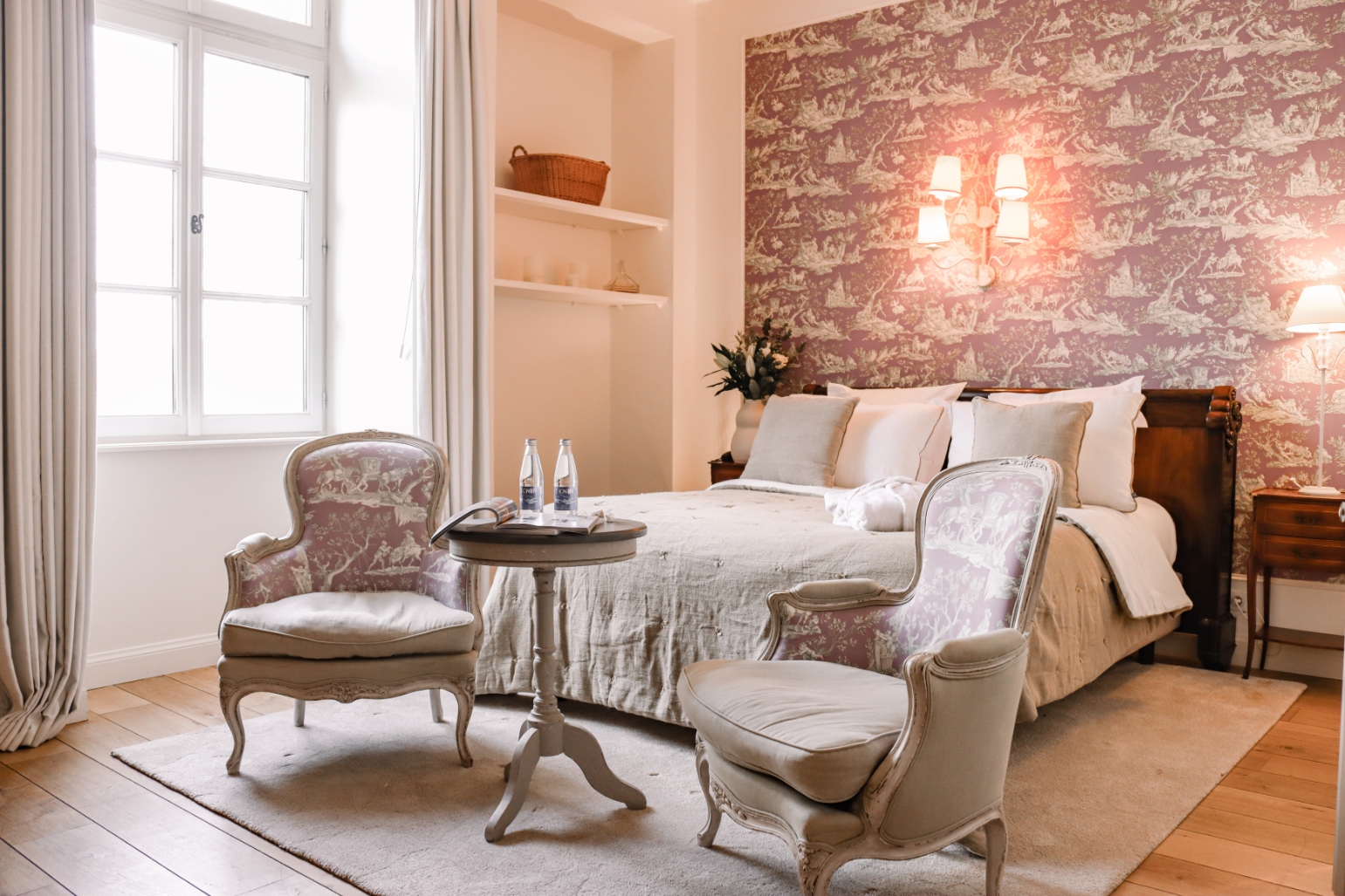 Room at Château Les Oliviers de Salettes, a charming hotel in the Drôme, with nude tones and linen sheets